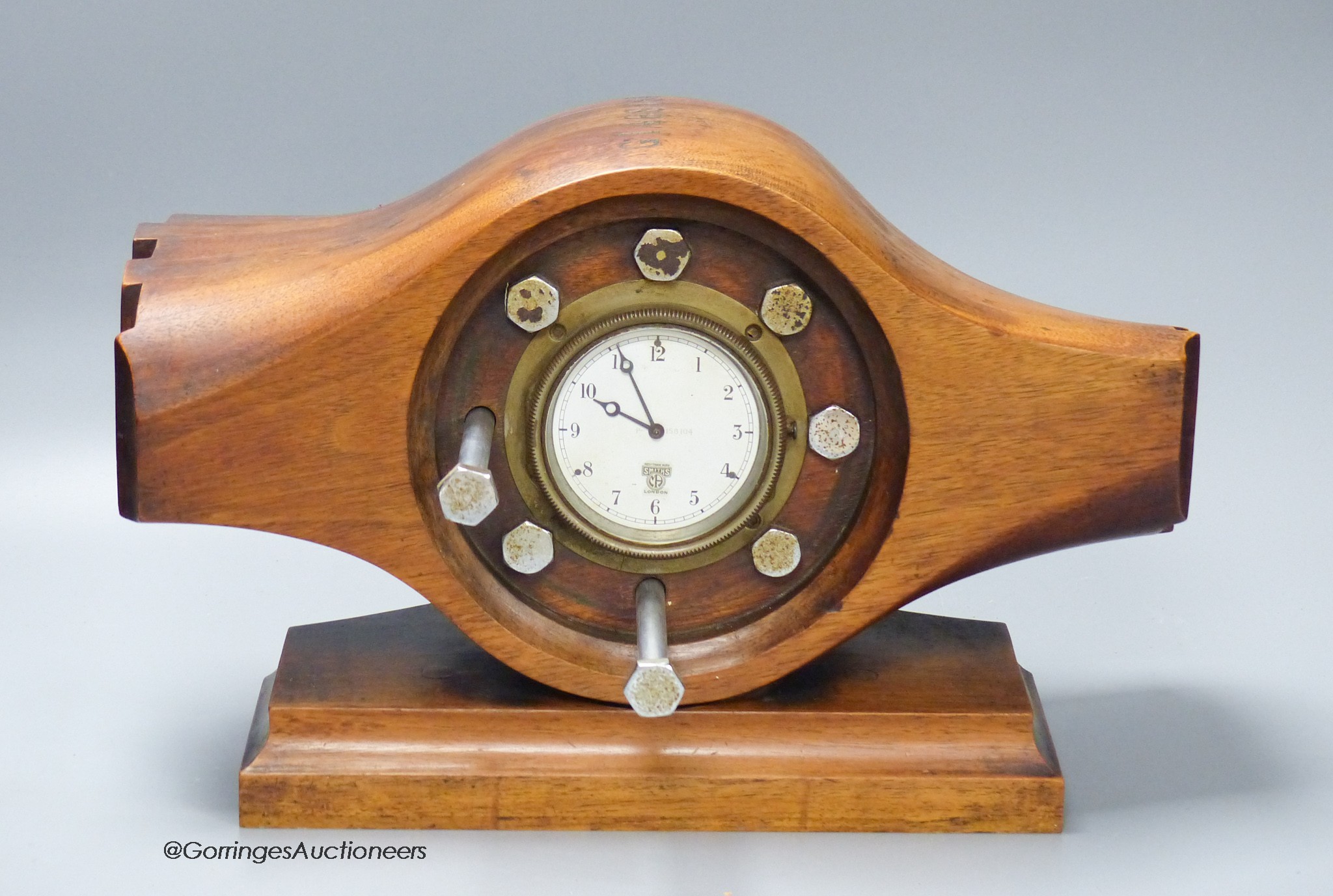 A Smith's aeroplane propeller hub mantel timepiece, 38cm long